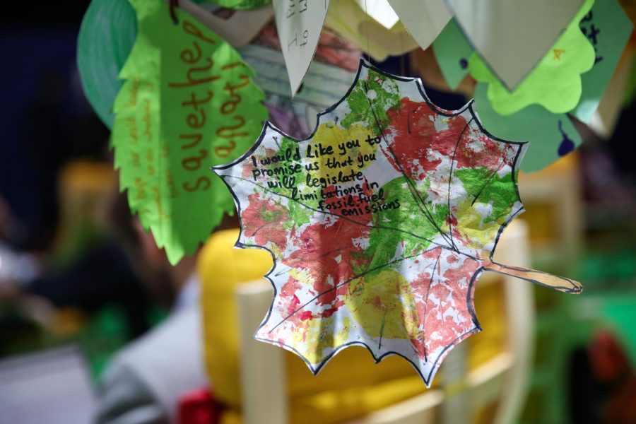 Messages from children around the world decorate the venue of COP26 in the hopes that world leaders will hear the plea for change. | Kiara Worth NonCommercial-ShareAlike 2.0 Generic (CC BY-NC-SA 2.0)