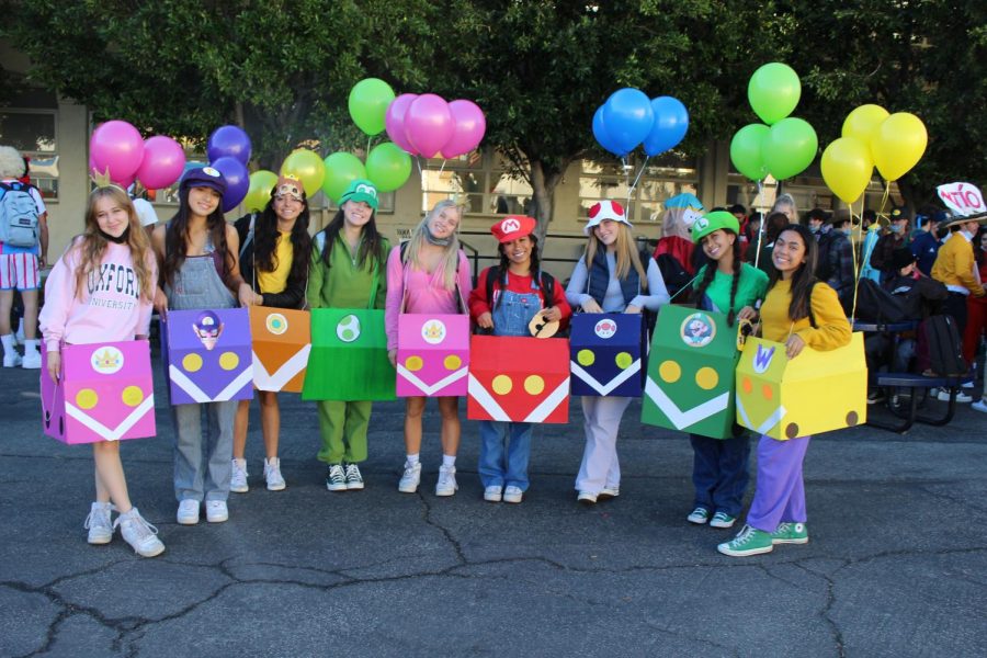 Who is your favorite Mario Kart character? Congratulations to the Mario Kart crew on winning the ND 2021 Halloween Costume Contest! Macy Graham ‘22 as Princess Peach, Abigail Valero ‘22 as Waluigi, Arianna Urena ‘22 as Waluigi, Julianne Roges ‘22 as Green Toad, Rileigh Chalmers ‘22 as Princess Peach, Jan Mendoza ‘22 as Mario, Catie Gowey ‘22 as Toad, Jacy Contreras ‘22 as Luigi, and Rose Vargas ‘22 as Wario.
