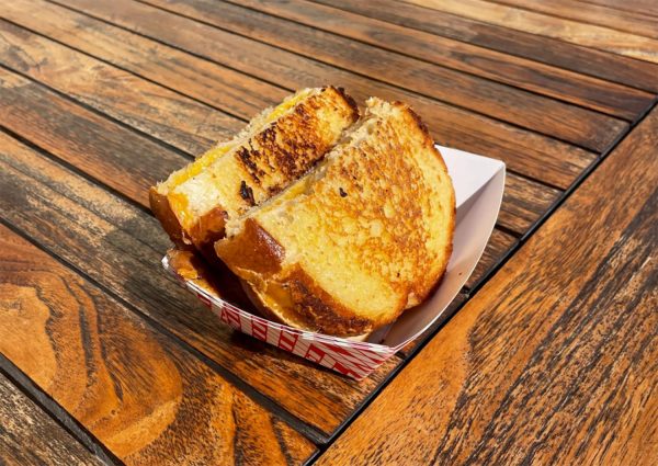 Students flock to the cafeteria for this popular after school snack -- the classic grilled cheese sandwich. The bread is the perfect color of brown, and the cheese is also melted perfectly.