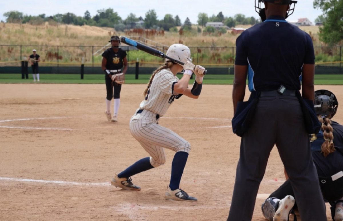 Keira Luderer plays at a softball tournament in Colorado. 
