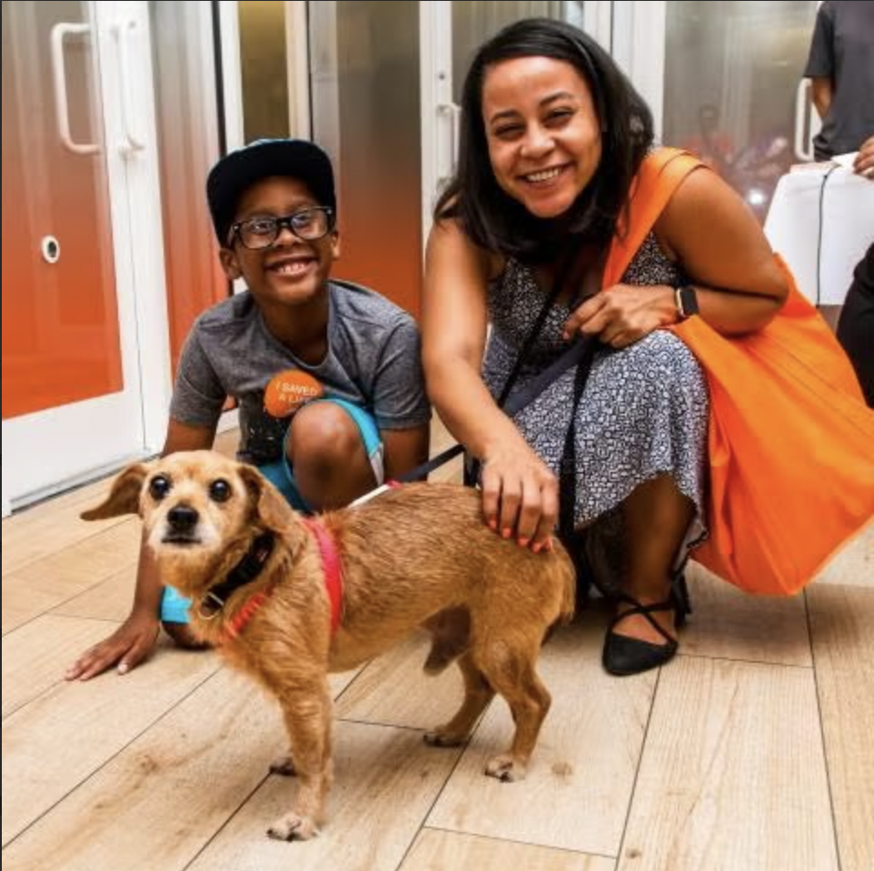 A mother and son from New York adopting an adorable dog from The Best Friends Animal Society. Through adoption, this family is Supporting the Best Friends Animal Society contributing to the end of mass animal euthanasia.