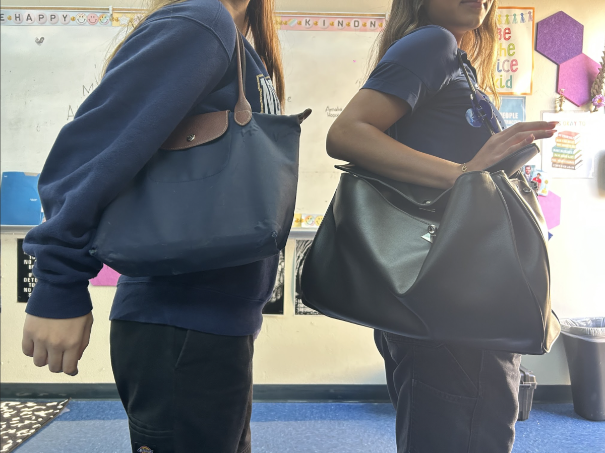 Elena Carli ‘27 and Jocie Antin ‘26, rock shoulder bags to add style and personality to their everyday look as a replacement for their backpacks. 